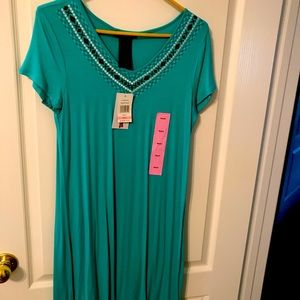 Fantastic ladies summer dress that will make a splash In It’s “Miami Green”.